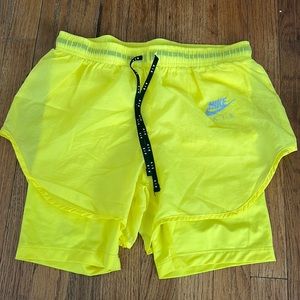 Yellow Nike exercise shorts